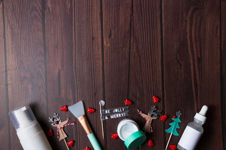 Christmas background with wooden table and decor flat layの写真素材