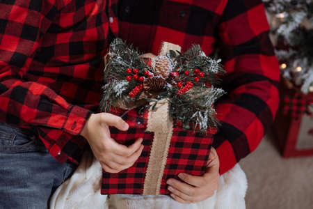Father and son holding a gift box at Christmasの写真素材