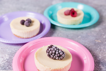 Cheesecake with delicious berries on a plateの写真素材