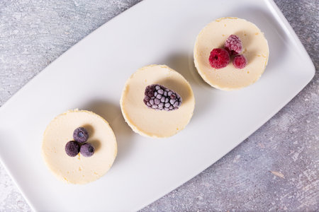 Cheesecake with delicious berries on a plateの写真素材