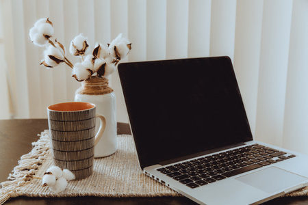 Cozy home office with handmade and eco-concious decorの写真素材