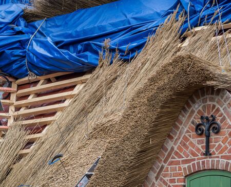 a new thatched house is built
