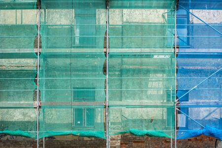 Protective nets on the scaffoldingの写真素材
