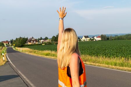 Woman needs help car breakdownの写真素材