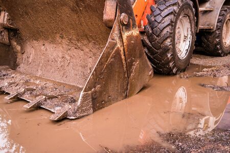 Wheel loader in the mud