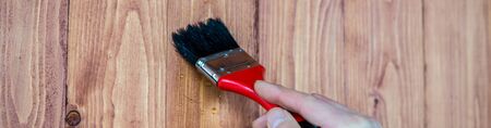 Painting wood with a brush
