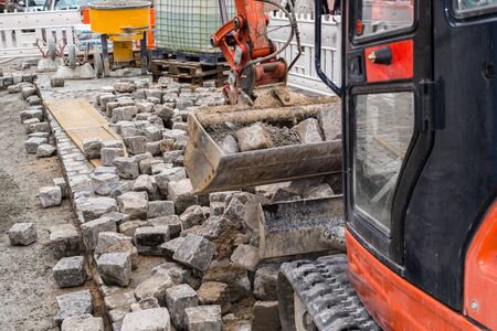 Excavator for road construction