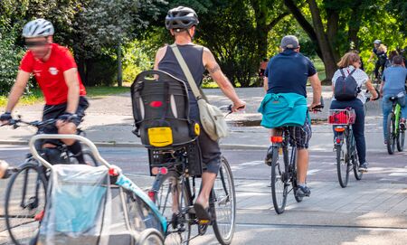 Many cyclists in a city: Eco-friendly drivingの写真素材