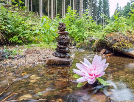 Balance of stones in a riverの写真素材