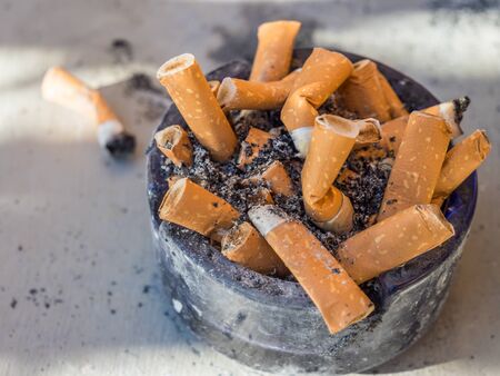 Full ashtray  with cigarettes