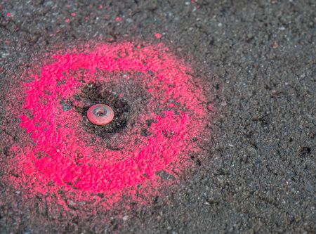 Survey point on a roadの写真素材