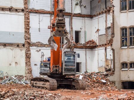 Excavator during demolition workの写真素材