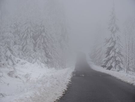 Dangerous road in winterの写真素材