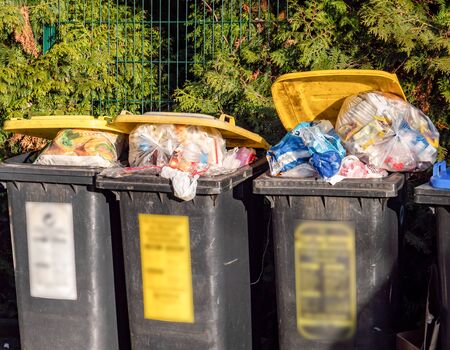 Too much plastic waste Yellow binの写真素材
