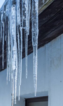 icicle on a roofの写真素材