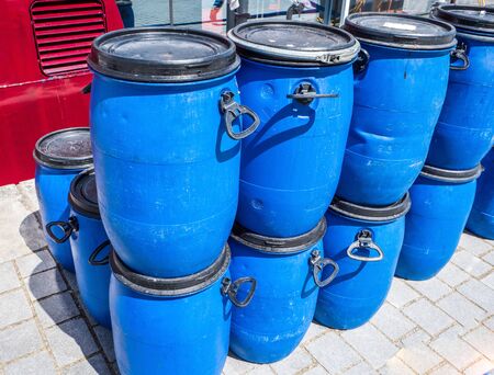 blue plastic barrels
