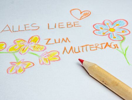 Happy Mother's Day painted primary school in german backgroundの写真素材