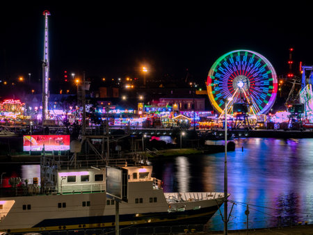 ferrisferris wheel with port at night in Szczecin Polandwheel with port at night in Szczecin Polandのeditorial素材