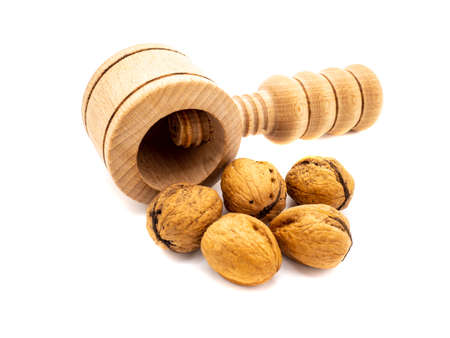 Nutcracker with walnuts isolated on white backgroundの写真素材