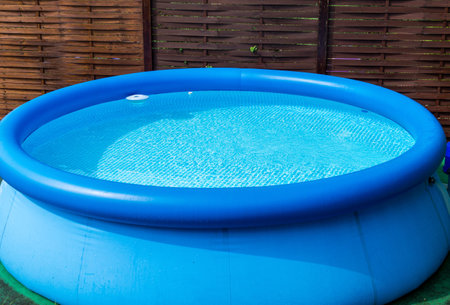 blue pool in the gardenの写真素材