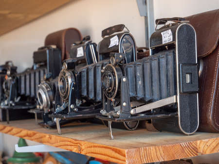 Antique analog cameras on a flea marketの写真素材