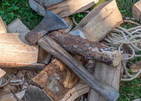 Ax with firewood for the fireplaceの写真素材