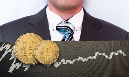 symbolic bitcoin coin on the stock exchangeの写真素材