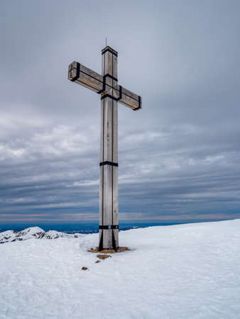 Summit cross of a mountain in the Alpsの写真素材