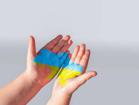 Children hands with Ukraine map iconの写真素材