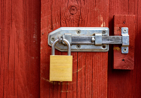old lock on wooden doorの写真素材
