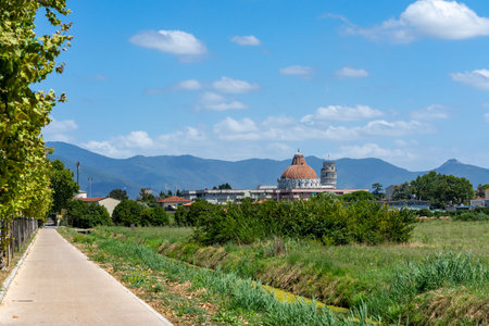 view on the cathedral with tower in pisaの写真素材
