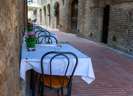 restaurant in an old street, Tuscany Italyの写真素材