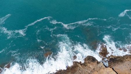 waves on the rocks in Tuscany Seaの写真素材