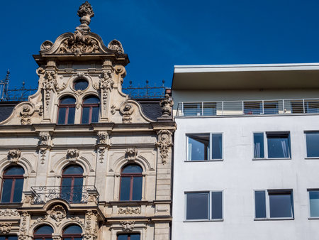 Old and new buildings contrast side by sideの写真素材