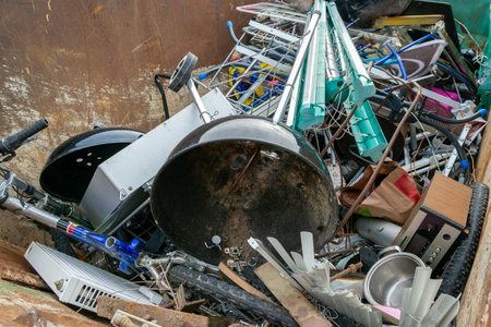 Metal scrap containers at a recycling center, environmental protectionの写真素材