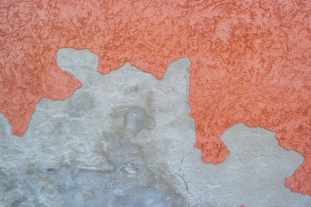 Peeling plaster on a house wall, structural damageの写真素材