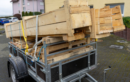 Trailer with lumber wooden boards for the houseの写真素材