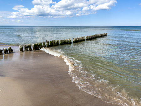 Groyne on the beach on the Polish Baltic Sea coastの写真素材