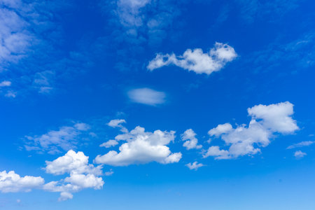 Fleecy clouds with blue sky, Texture backgroundの写真素材