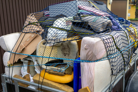 Bulky waste from a household clearance on a trailerの写真素材