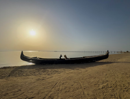 old boat on the beach in the sunset egypt on the red seaの写真素材