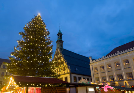 Old Christmas market in Zwickau with town hall in the backgroundの写真素材