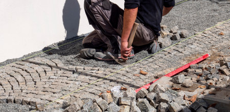 Cobblestones are being laid and renovated in an old townの写真素材