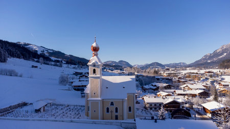 View of the the village church in Going am Wilden Kaiser in Austria Tyrol European Alpsの写真素材