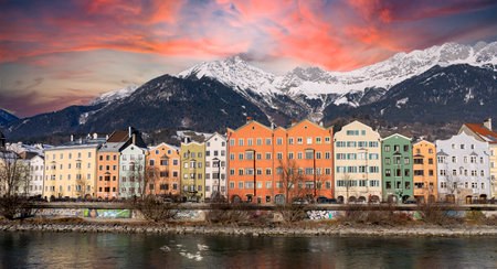 Innsbruck in Austria Tyrol with traditional buildings and Alpine peaks panoramic view Karwendel at sunsetの写真素材