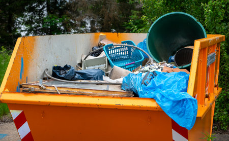 Containers with construction rubble and garbage during the renovation of a houseの写真素材