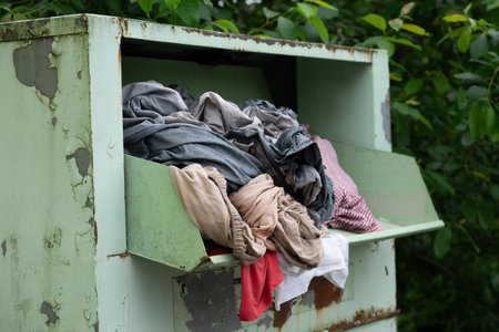 Container for collection of old clothes for recycling in the cityの写真素材