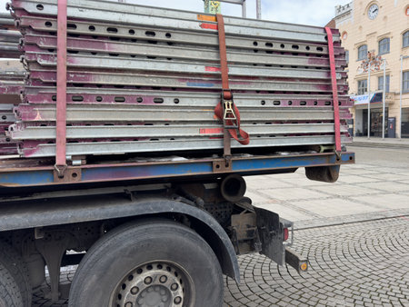 Securing the load on the truck with a tension strapの写真素材