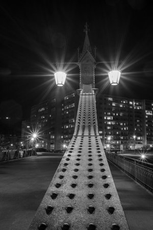 architecture the paradise bridge over the mulde river in zwickau saxony east germany at night black and white photography verticalの写真素材