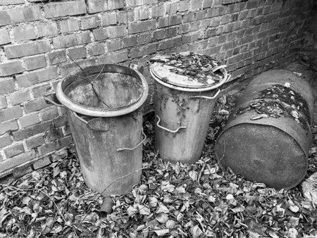 old gdr metal garbage cans Black and White Photoの写真素材
